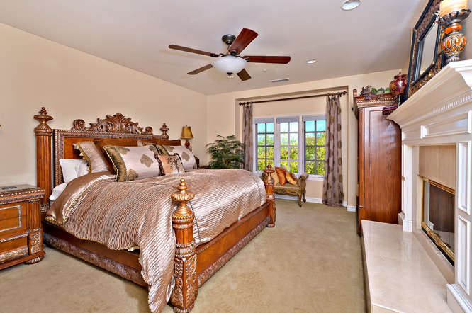Vicki Gunvalson's Master Bedroom with Fireplace
